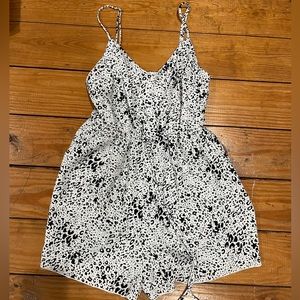 (402) —WHITE AND BLACK ROMPER—